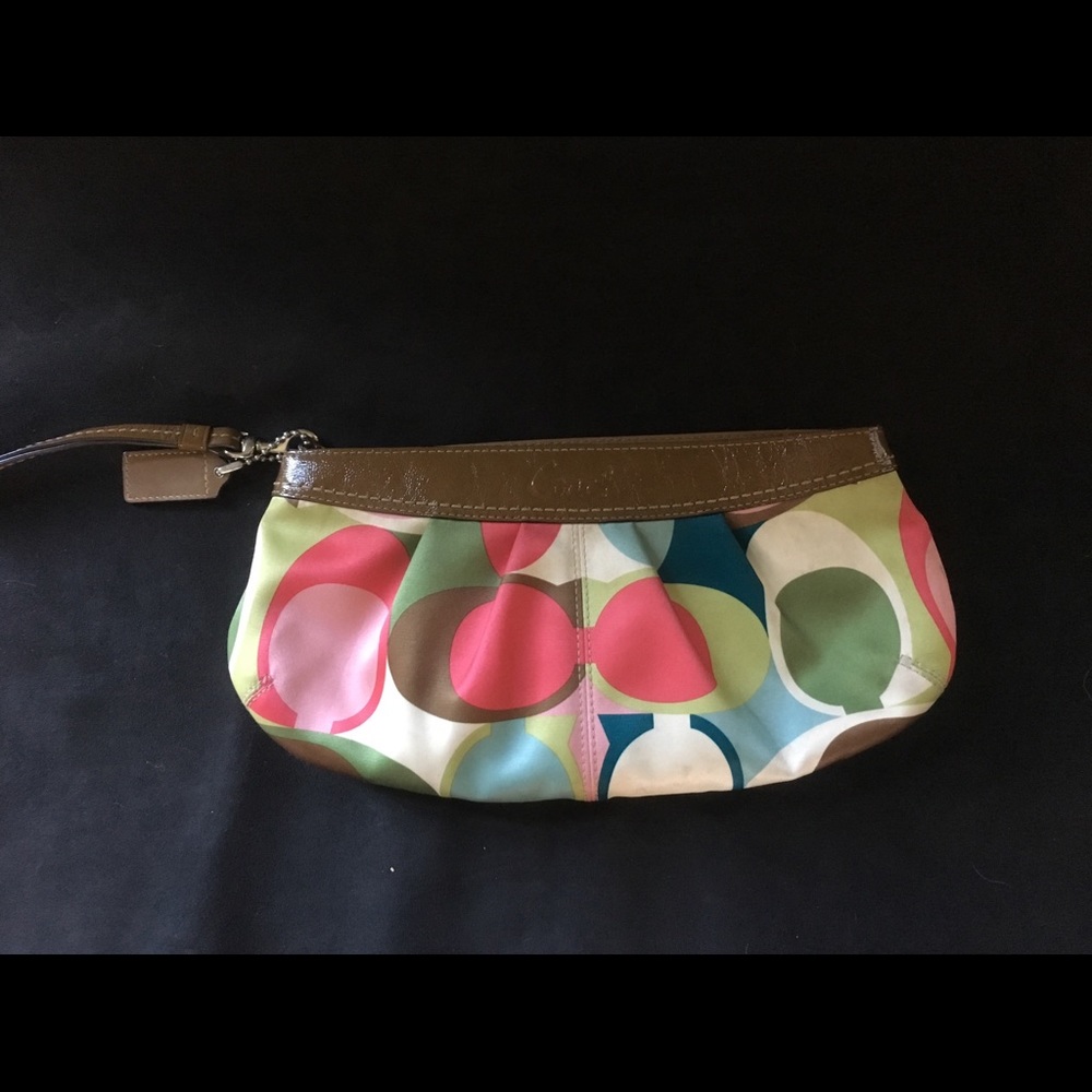 Coach printed clutch with wrist handle